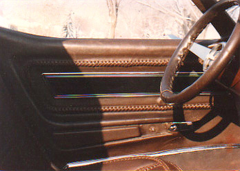 corvette door panel custom made using a braided leather construction method