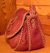  This picture is a side view of the purse showing a good look at the different braids it is made with. 