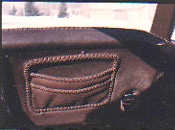 customized corvette leather interior using braided leather throughout including on this dash pocket