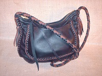  And here is the other side, of the same bag, with a pocket. A Black bag with Black/Mahogany braided seams and strap. 