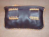  The back of this same leather belt pouch showing the belt loops. 