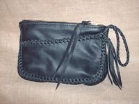  This is a picture of a Black clutch purse similar to the others on this page. 