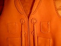 cowboy leather vest conchoes or concho's. How is it spelled? :) 