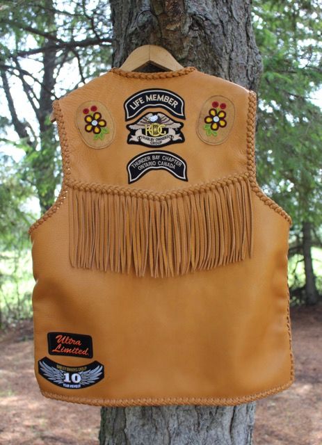 leather vest with fringe and bead work