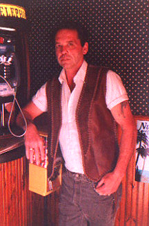 Mike wearing his braided leather vest with the long lapels 