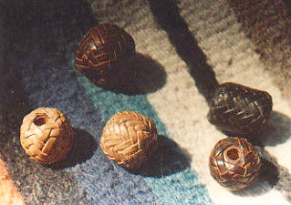 braided leather pineapple knots over wooden beads
